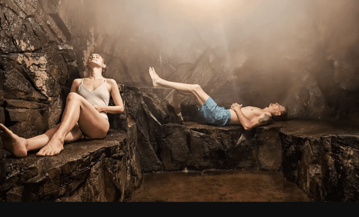 Screenshot 2026 10 05 at 6.06.05 PM Couple relaxing in a steam room at Twin Peaks Lodge in Ouray, Colorado.